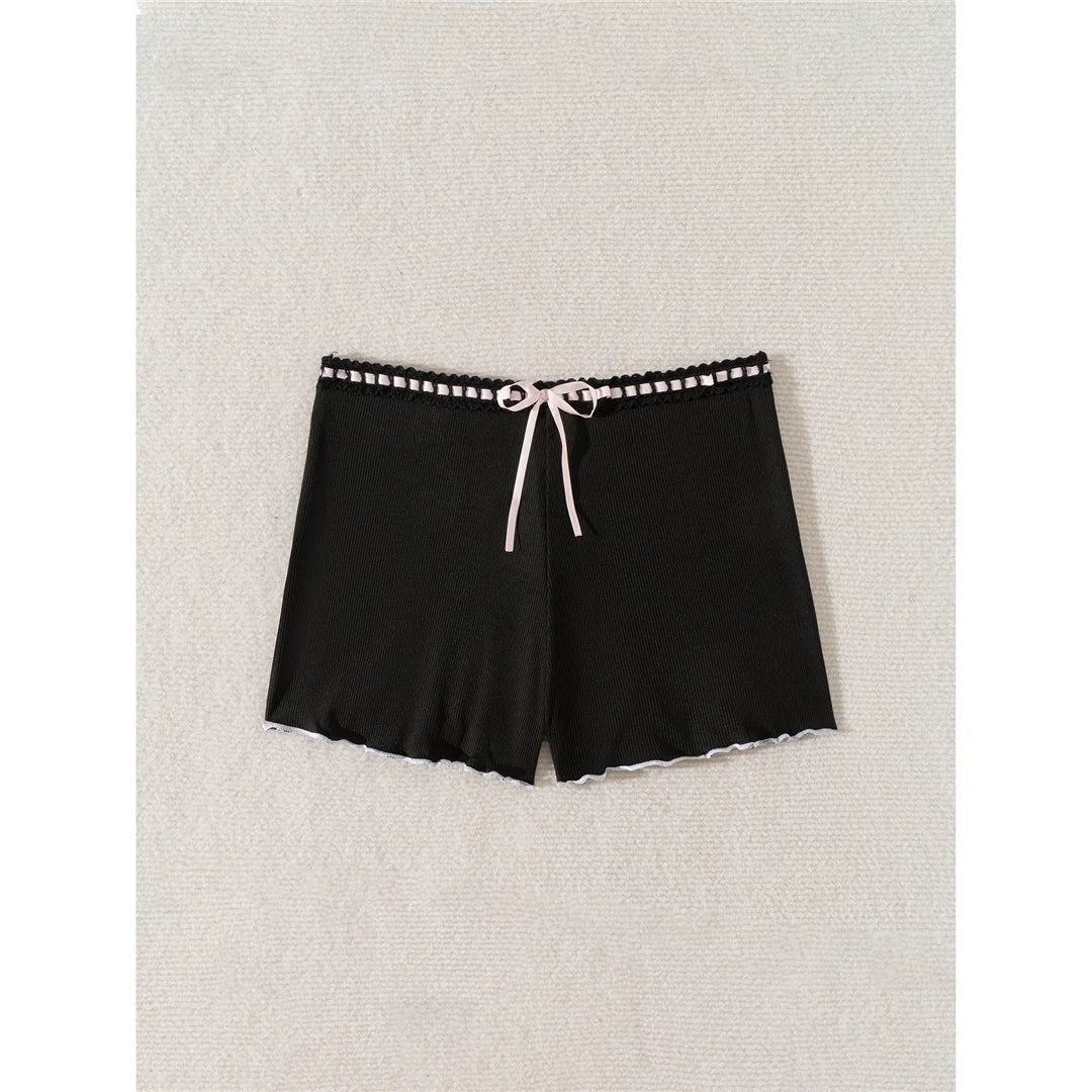 Bow Ribbed Bikini Bottoms with charming bow detail, ribbed texture, solid color, wire-free mid waist, perfect for mixing and matching swimwear style.