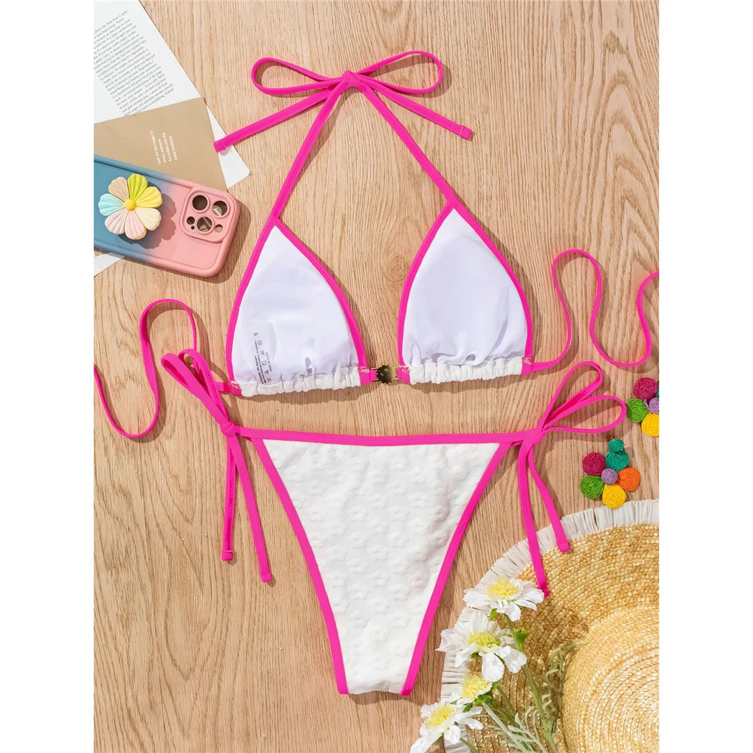 Pearl rhinestones halter high cut bikini in solid white for a glamorous and sophisticated beach style.