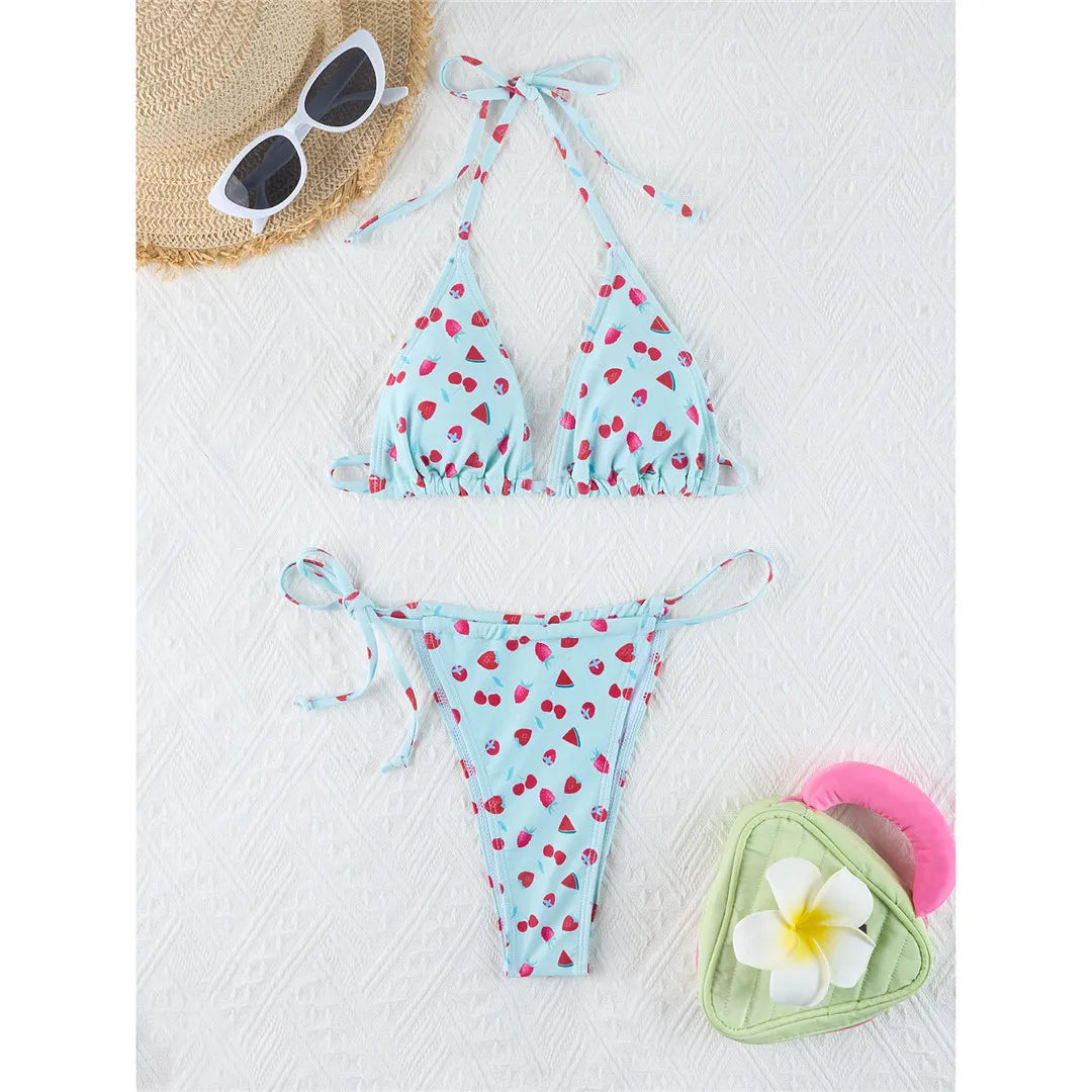 Vibrant Four-Color Halter Bikini Set with Captivating Flower Print, Made from Nylon and Spandex. Features High-Leg Cut, Wire Free Support and Low Waist Style in Green, Blue and Yellow Colors. Fits True to Size, Ideal for Middle Aged Women. Comes with Padding for Extra Comfort. Brand New and Available in Stock.