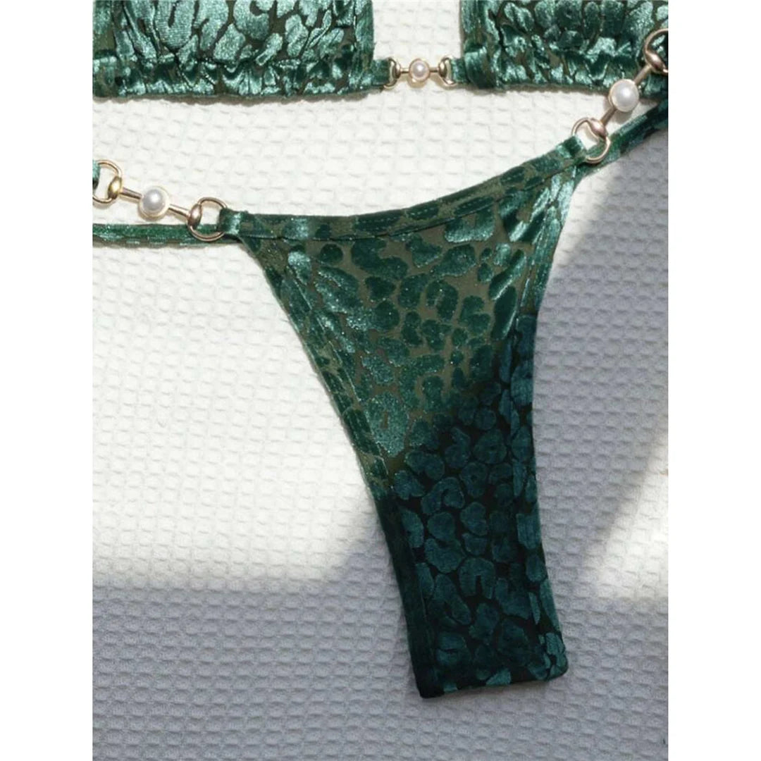 Leopard Print Mini Micro Thong Bikini Adorned with Delicate Pearls. Two-Piece Swimwear made of Nylon and Spandex. Features Low Waist, Wire-Free Support, and True to Size Fit. Pattern: Leopard Print. Includes Padded Cups, Available in Sizes: S, M, L, Female, Varleinsar, V5207. Colors Available: Blue Leopard, Green Leopard, Yellow Blue Leopard. In-Stock with Free Shipping.