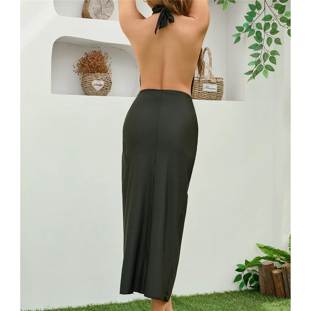 Deep Halter Swimsuit with Skirt, featuring adjustable halter neckline, monochrome solid design, polyester and spandex blend for an elegant beach look.