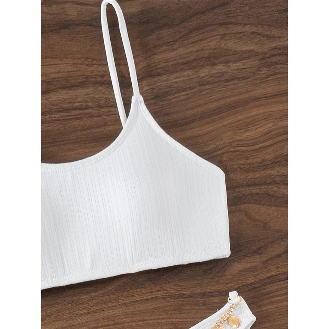 Metal Chains High Leg Cut Brazilian Bikini set with edgy metal chain accents, Polyester Spandex material, solid pattern, wire-free, mid waist design, enhances silhouette for a bold look.