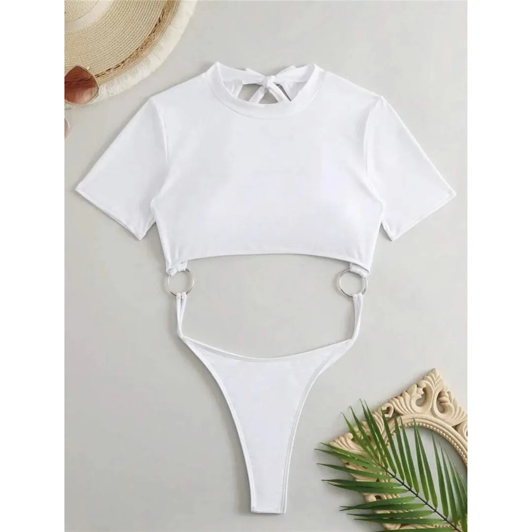 Elegant Short Sleeve One Piece Swimsuit for Women, Combining Mini Micro Thong Cut with Full Top Coverage, Made of Nylon and Spandex, Solid Pattern, Free Support, True to Size, Sleek Design for a Sophisticated Poolside Style, Available in Sizes S, M, L, and XL, Comes in Colors Black, Blue, Coffee, Green, Pink, Red, White, Hot Pink, and Lake Blue