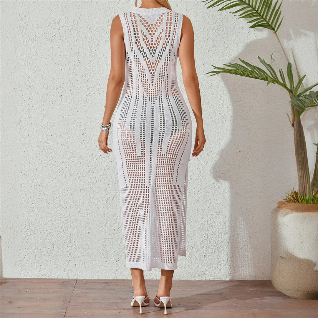 Hollow out see-through crochet knitted tunic in solid white for an elegant and relaxed beach cover-up.