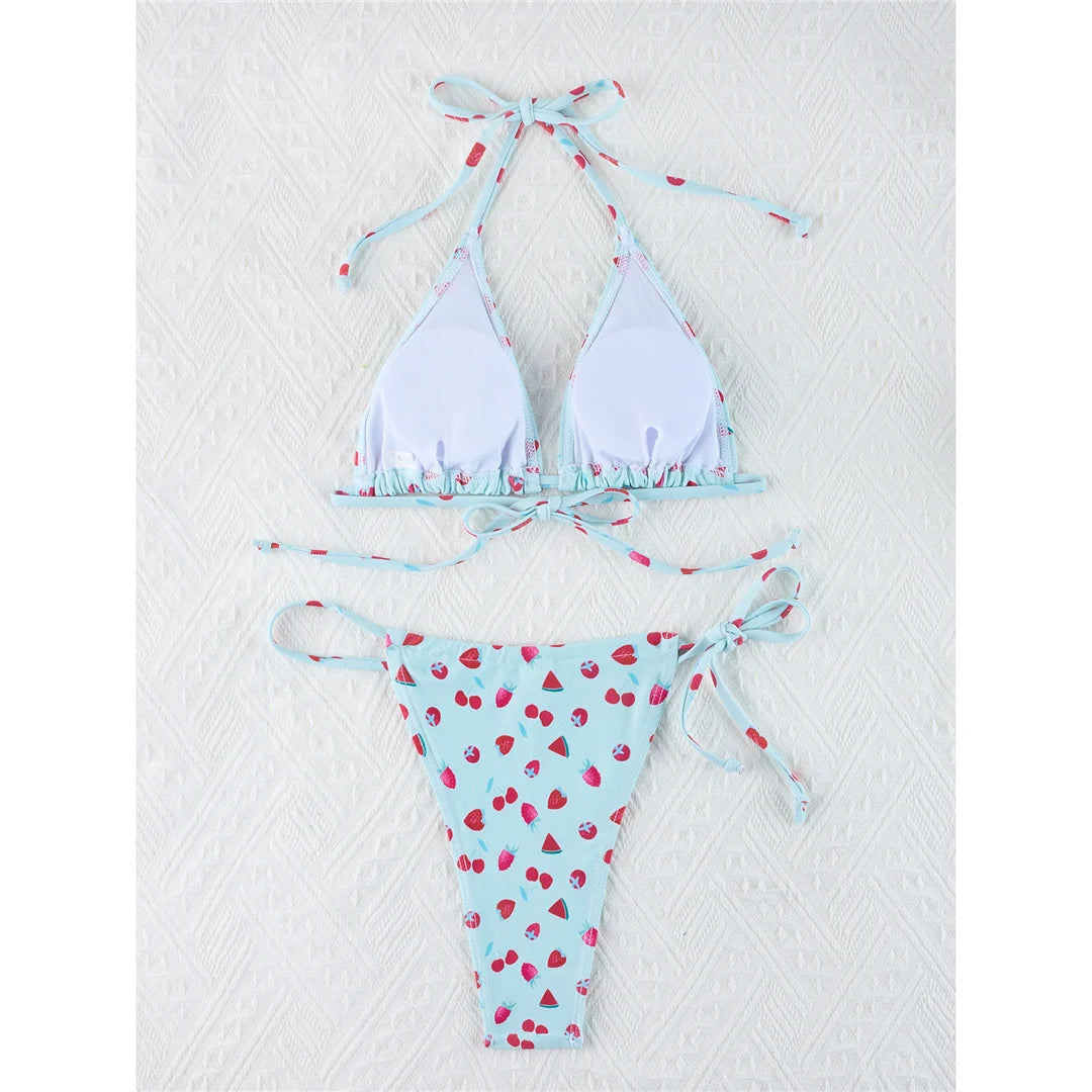 Vibrant Four-Color Halter Bikini Set with Captivating Flower Print, Made from Nylon and Spandex. Features High-Leg Cut, Wire Free Support and Low Waist Style in Green, Blue and Yellow Colors. Fits True to Size, Ideal for Middle Aged Women. Comes with Padding for Extra Comfort. Brand New and Available in Stock.