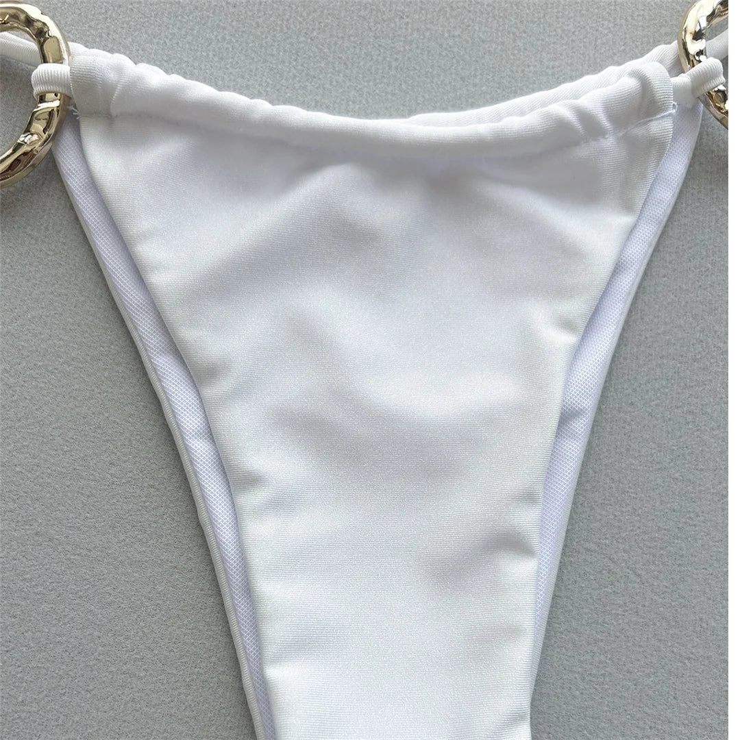 Metal Rings Halter Strappy High Cut Bikini set with chic metal ring accents, Polyester Spandex material, solid pattern, wire-free, low waist design, enhances silhouette for elegance and fashion.