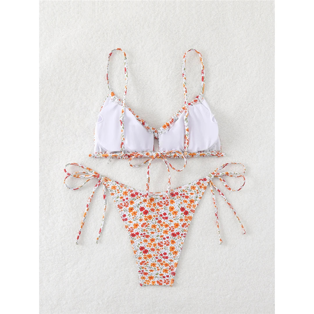 Flowers Printed Floral High Leg Cut Bikini set with captivating floral print, Polyester Spandex material, wire-free, low waist design for women, enhances curves for a stylish beachside look.