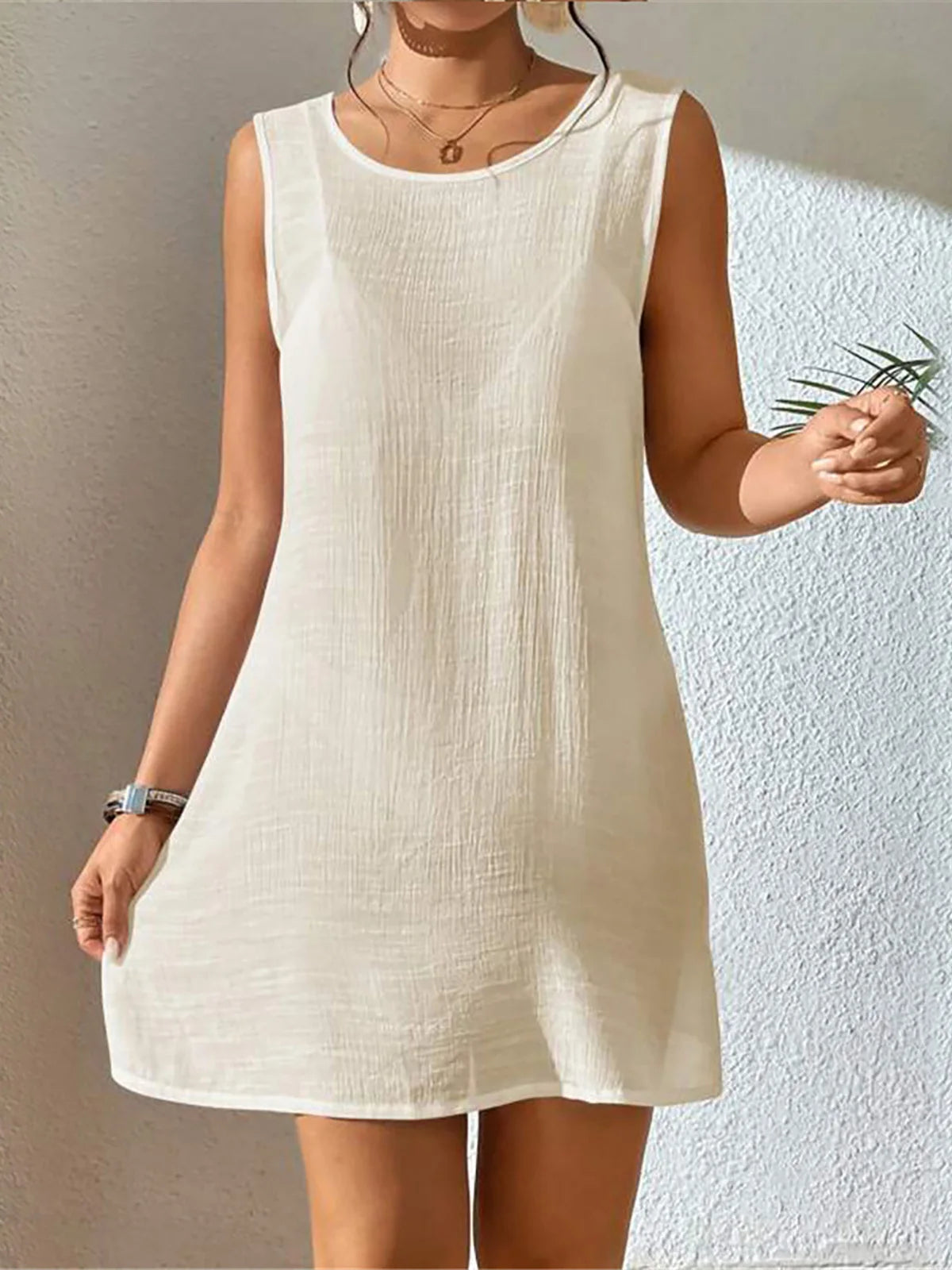 5 Colors Backless Crochet Tunic Beach Cover Up Available in Beige, Black, White, Pink, and Green, Made of Nylon, Polyester, Cotton, Fits True to Size for Women aged 18-35, Available in Stock with Free Shipping