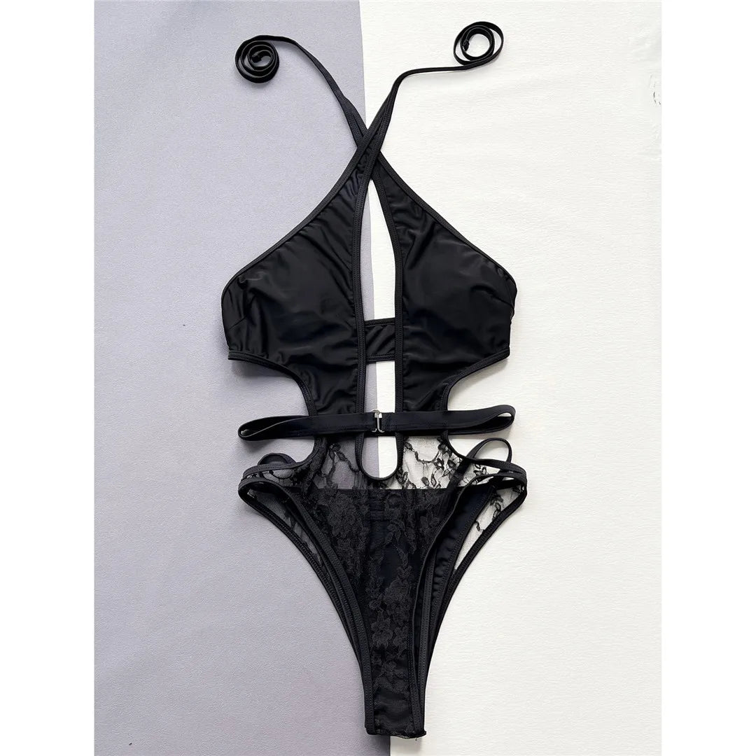 Sophisticated Backless One-Piece Monokini with Halter Neckline and High Cut Design, Crafted from Nylon and Spandex, Perfect Fit for Women. Features Free Support and Padding. Adds an Element of Intrigue with Cut-Out Detail. Solid Black, New and Available for Immediate Shipping.