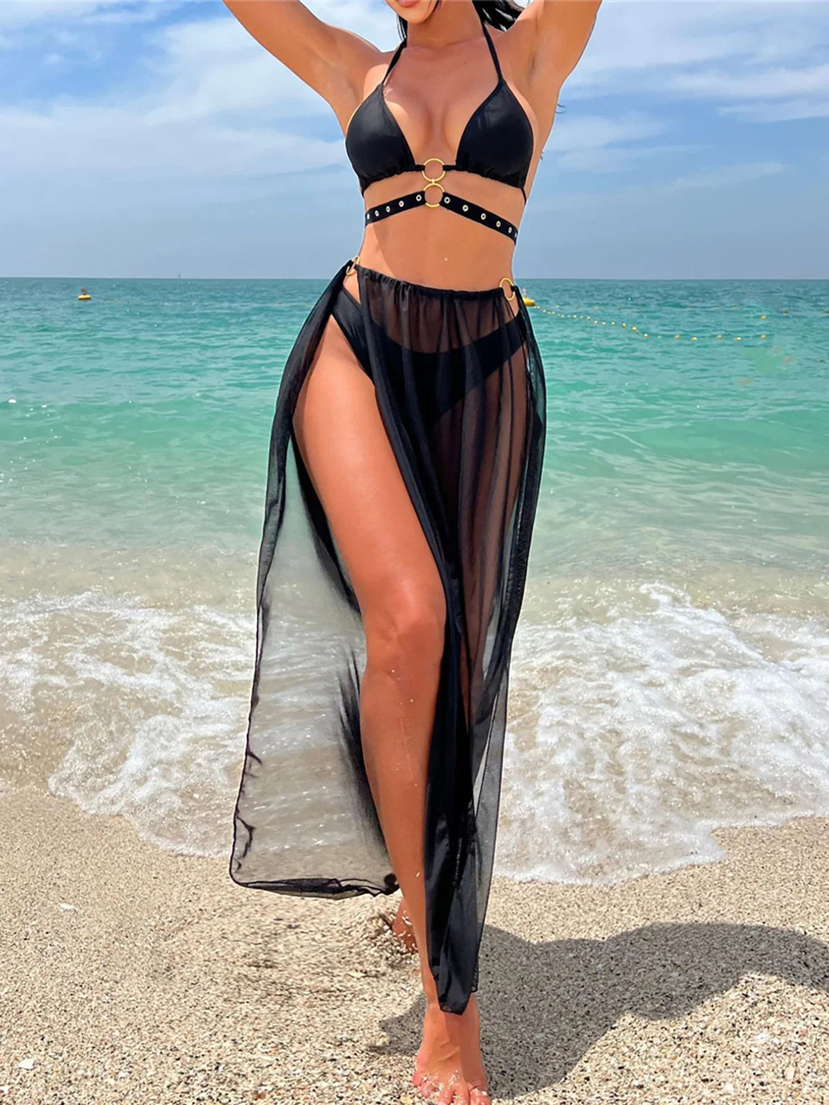 Halter Bikini Set with High Split Skirt, Three Piece Swimwear Ensemble, Made of Nylon and Spandex, Solid Black, Wire-Free Support, Low Waist Design, True to Size, Women's Bikini Set, Comes with Padding, Available in Sizes Small, Medium, Large, Free Shipping.