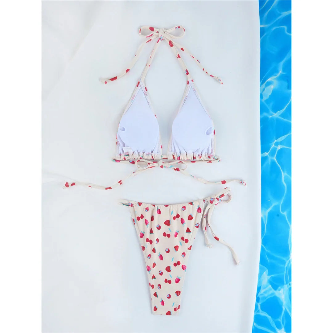 Vibrant Four-Color Halter Bikini Set with Captivating Flower Print, Made from Nylon and Spandex. Features High-Leg Cut, Wire Free Support and Low Waist Style in Green, Blue and Yellow Colors. Fits True to Size, Ideal for Middle Aged Women. Comes with Padding for Extra Comfort. Brand New and Available in Stock.