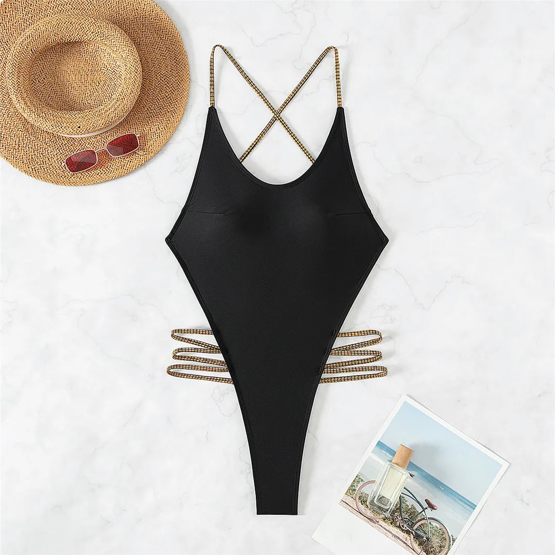 Ultra-Modern String Bikini Mini Micro Thong One Piece Swimsuit for Women, Features a Cross-Back Design, Crafted from Nylon and Spandex in Solid Black, Offers Wire Free Support and Fits True to Size, Ideal for making a Daring Fashion Statement while enjoying the Sun and Waves.