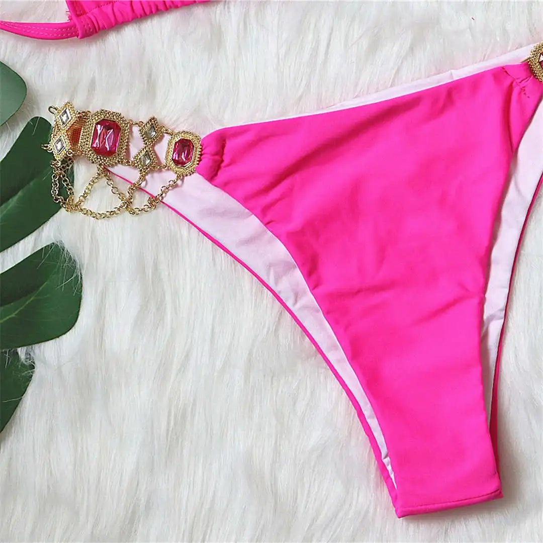 Opulent jewelled rhinestones luxury diamond bikini set available in Yellow, Red, Hot Pink, White, Silver, Purple, Sky Blue, and Black. A shimmering two-piece swimsuit made from nylon and spandex, featuring wire-free support and low waist design. Fits true to size, perfect for women who seek glamour and luxury in their swimwear.