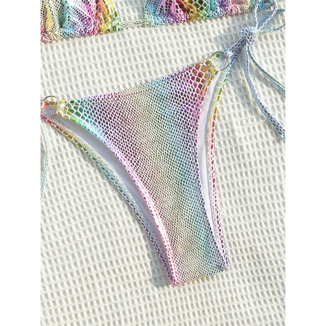 Unleash your wild side with a colorful snake skin halter strappy two-piece bikini set, featuring vibrant colors and a fierce snake skin pattern. Made from polyester and spandex, this wire-free, low waist bikini offers a flattering fit and includes comfortable halter straps and chic cut for any beach day adventure. Perfect for women seeking a bold statement by the water.