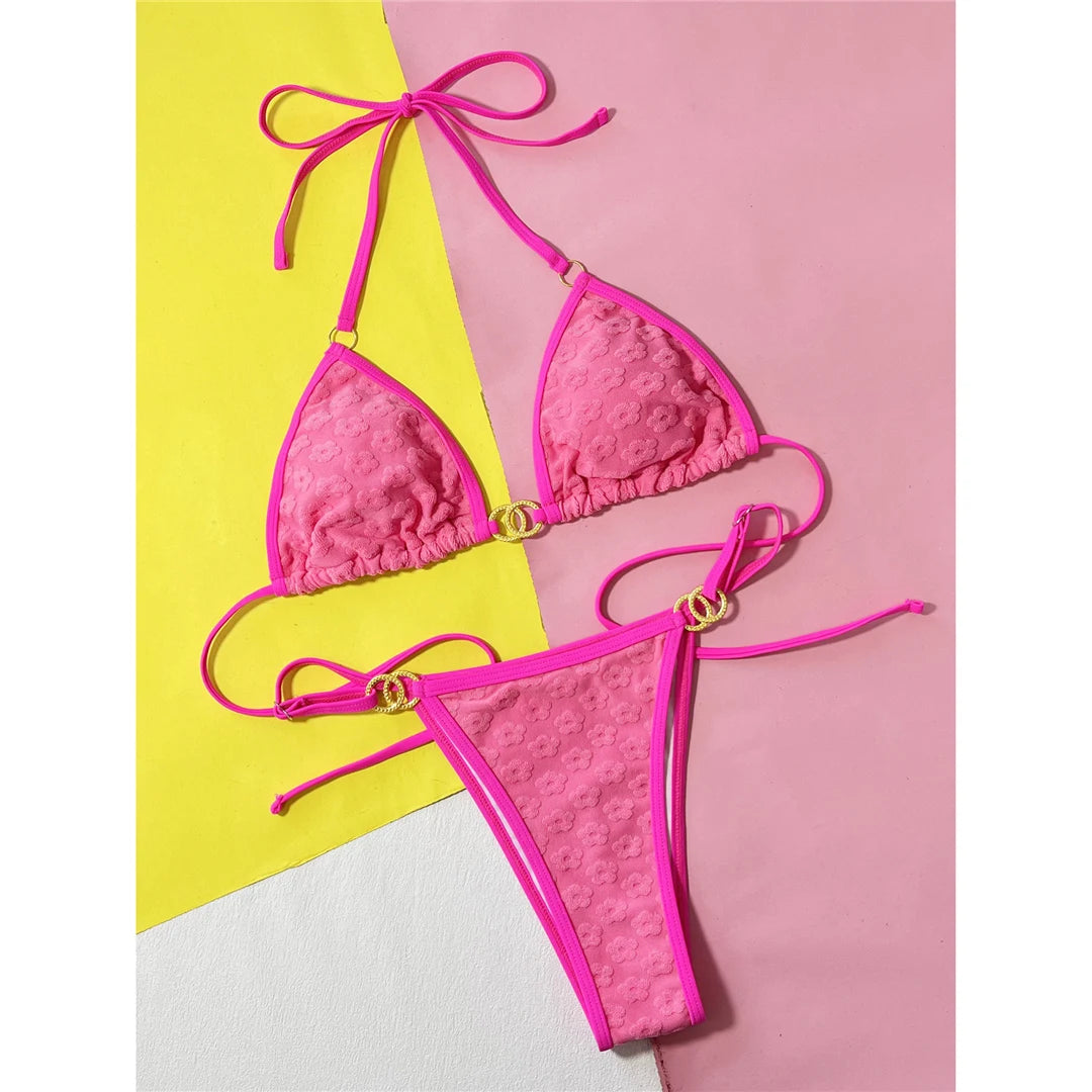 Chic and Modern Halter Bikini Set for Women with High Leg Cut Silhouettes and Metal Rings, Crafted from Nylon and Spandex, Solid Hot Pink Color, Offers Wire Free Support, Low Waist Design, Fits True to Size, Perfect for Pool and Beach Getaways.