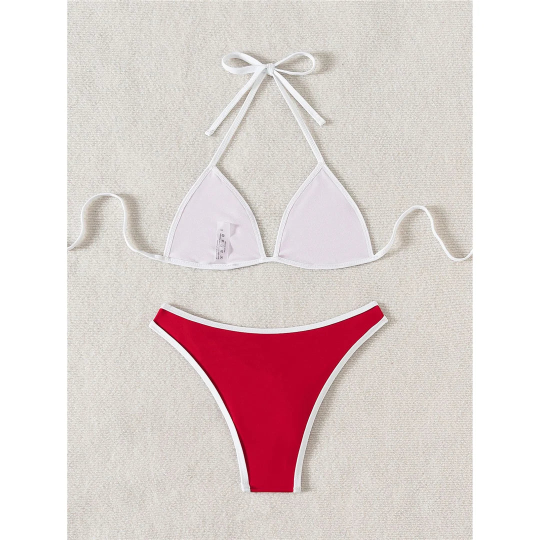 Halter Brazilian high cut bikini set in solid red with padded design for a confident and fashionable beach look.