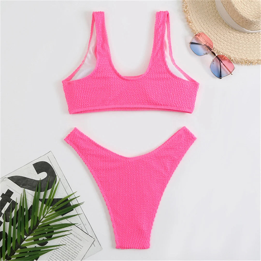 High cut bikini set in eight colors with wrinkled crinkled texture and solid design for a chic and flattering fit.