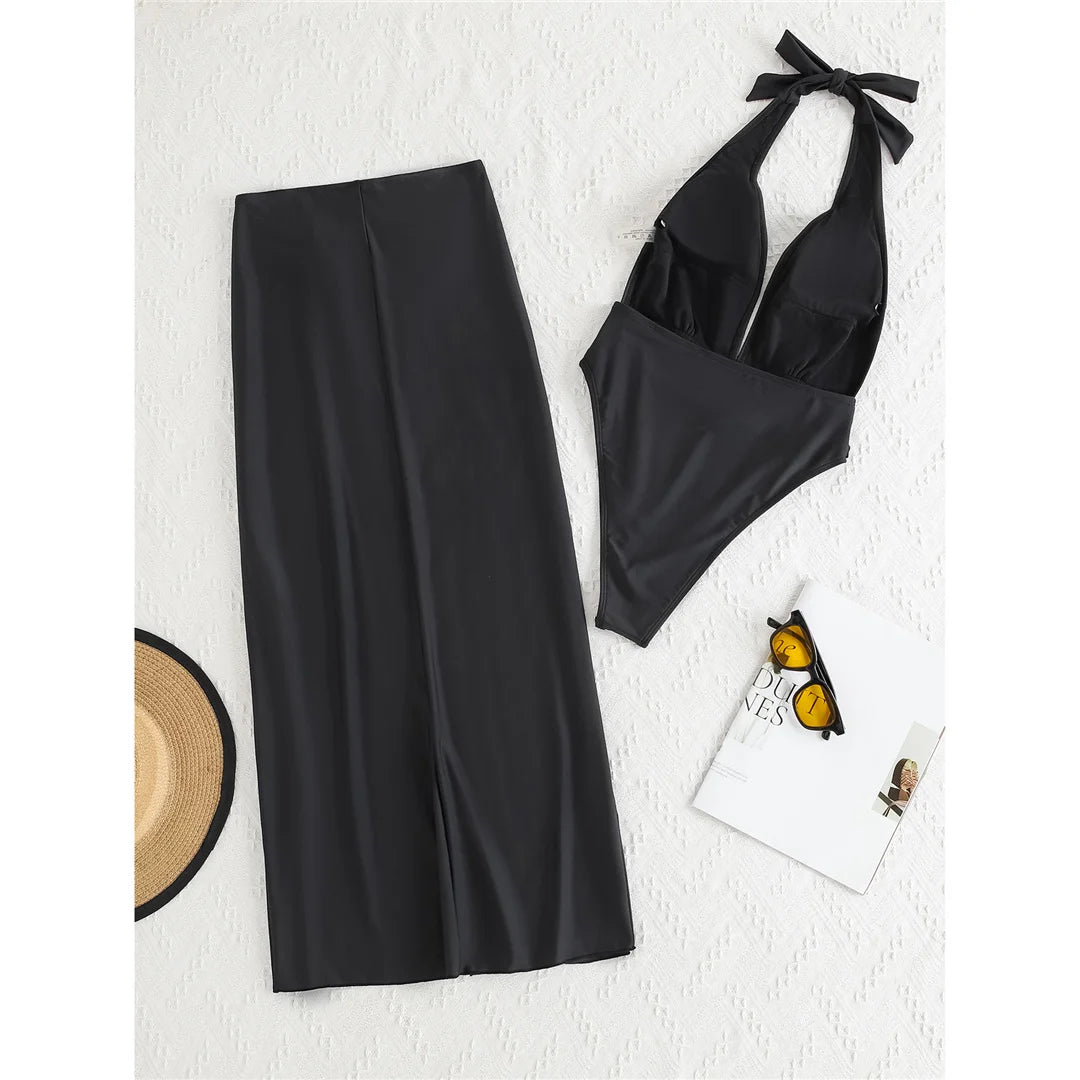Deep Halter Swimsuit with Skirt, featuring adjustable halter neckline, monochrome solid design, polyester and spandex blend for an elegant beach look.