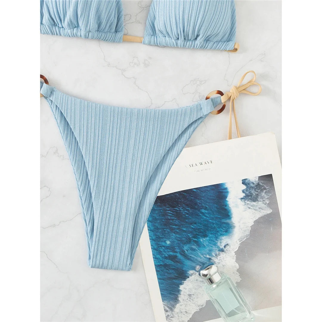 Stylish Ribbed Padded Brazilian Bikini Set, Two-Piece Design with a Flattering Fit, Crafted from Nylon and Spandex, Wire Free Support, Low Waist Style, Available in Women's Sizes S, M, L. Features Solid Pattern and Padded for Comfort, Fits True to Size, Offered in Multiple Colors Including Black, Blue, White, Yellow, Gray, Light Coffee, Light Blue, and Multicolor. Ideal for Women aged 18-35 and Adults, In Stock, New Condition, Free Shipping Available.