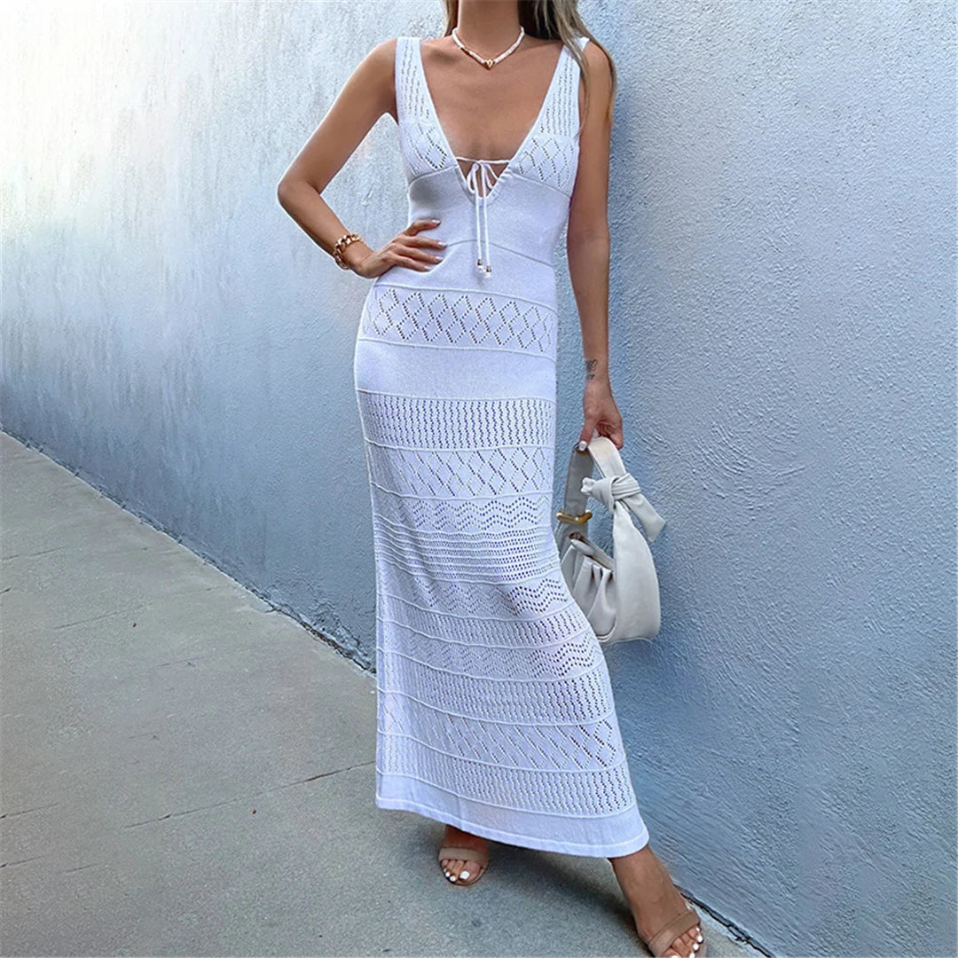 V-neck cut-out crochet knitted tunic, intricate hollow-out patterns, polyester solid design, women&#39;s stylish beach cover-up.