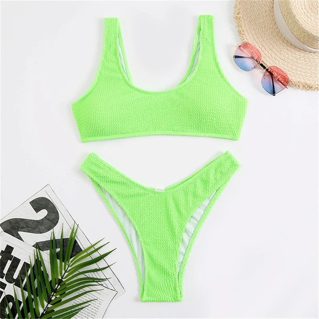 High cut bikini set in eight colors with wrinkled crinkled texture and solid design for a chic and flattering fit.
