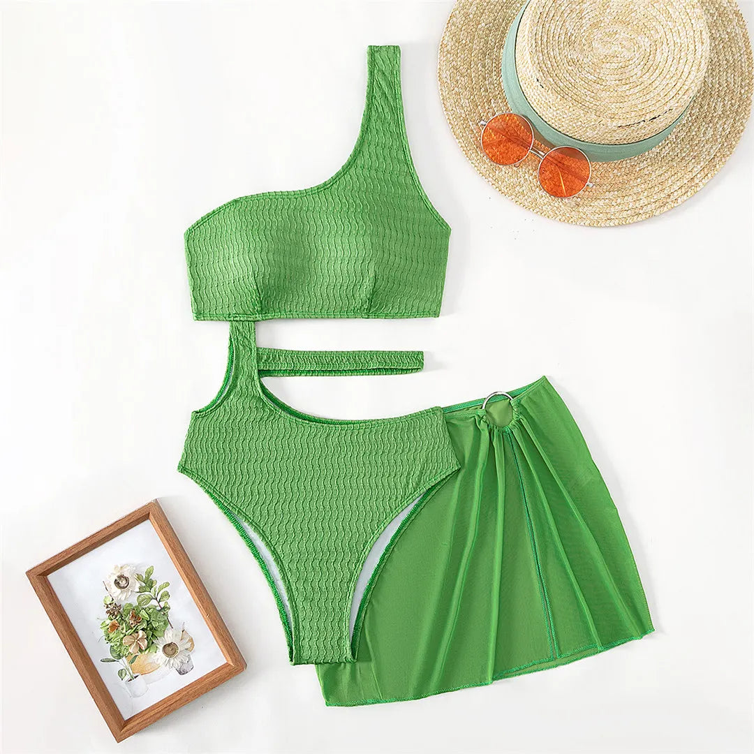 Asymmetric Tummy Cut Out One Piece Swimsuit with Coordinating Skirt in Green, Made of Nylon and Spandex, Wire Free Support, Fits True to Size, Available in Sizes XS, S, M, L, In Stock with Free Shipping, Perfect for Women Aged 18-35 and Adult Females