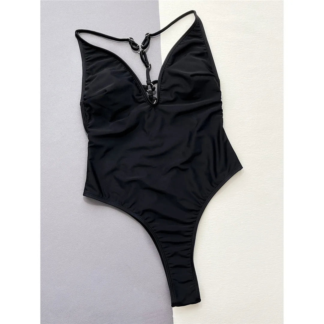 Elegant High-Cut Monokini with Backless Design, Crafted from Nylon and Spandex, Perfect Fit for Women. Comes in Black with Free Support and Padding. A Timeless Piece Ideal for Adults Aged 18-35. Perfect for Beach and Poolside Lounging. New and in Stock.