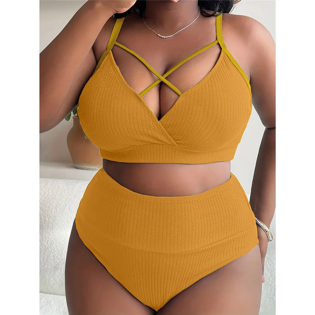 Flattering ribbed two-piece bikini set designed for women of all curves in sizes 0XL to 4XL. With its solid pattern and snug fit, this high-waisted bikini made from high-stretch nylon and spandex is a celebration of comfort and style. Available in colours Black, Green, Watermelon Red, and Yellow. Perfect for a stylish swim in any season.