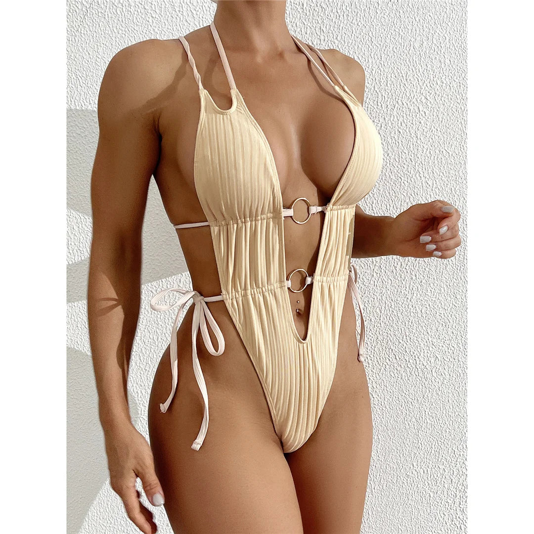 Deep V-neck halter one-piece swimsuit, high-leg mini thong design, adjustable triangle top, monochrome solid pattern, polyester spandex blend, women's bold and elegant swimwear.