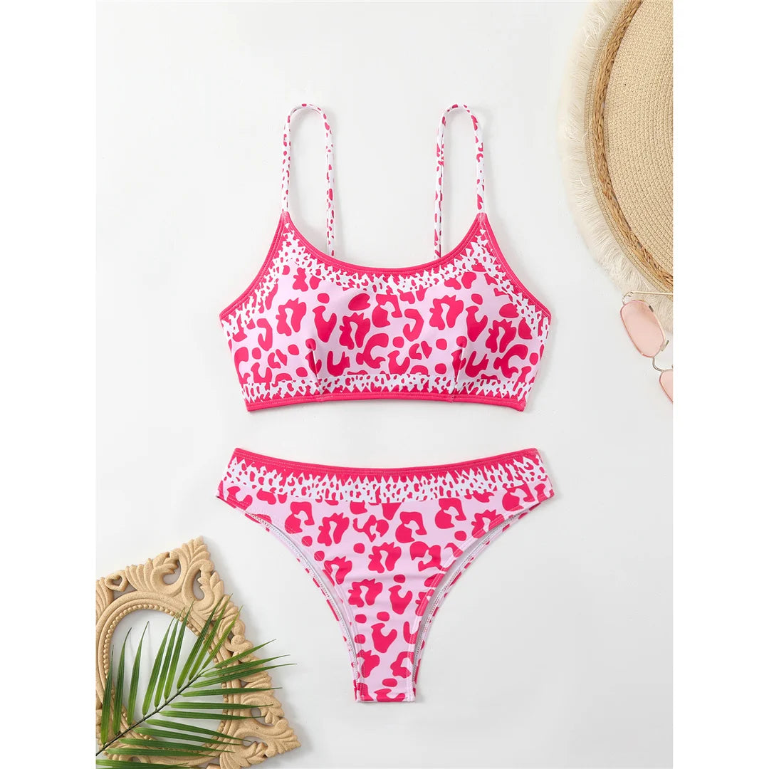 Bold Leopard Print Brazilian High Cut Bikini Set in Pink, Two-Piece Swimwear with Cheeky Flair, Made from Comfortable and Stretchy Nylon and Spandex Material, Offers Wire Free Support and Padding, Fits True to Size, Suitable for Women, Available in Sizes S, M, L