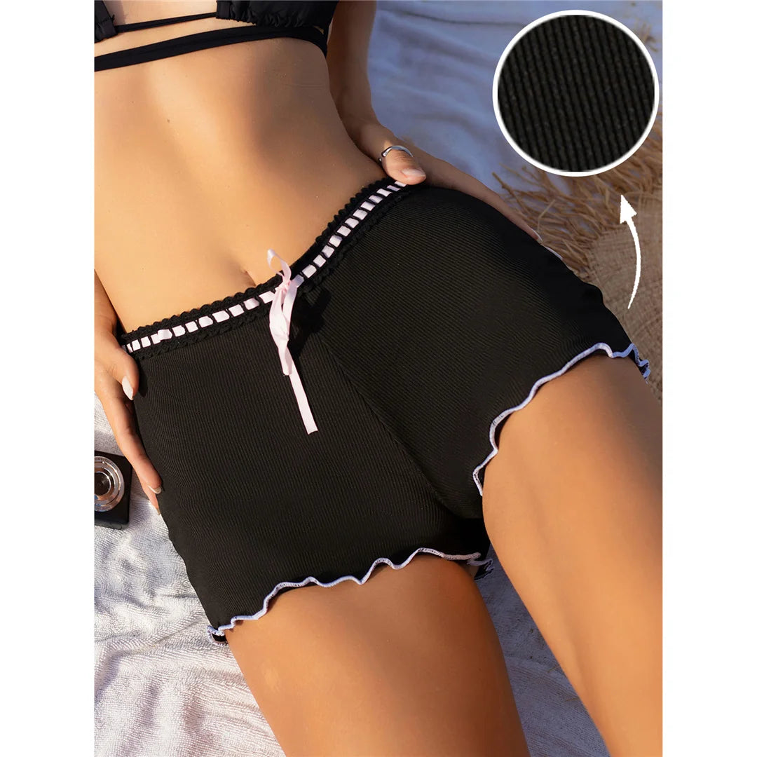 Bow Ribbed Bikini Bottoms with charming bow detail, ribbed texture, solid color, wire-free mid waist, perfect for mixing and matching swimwear style.