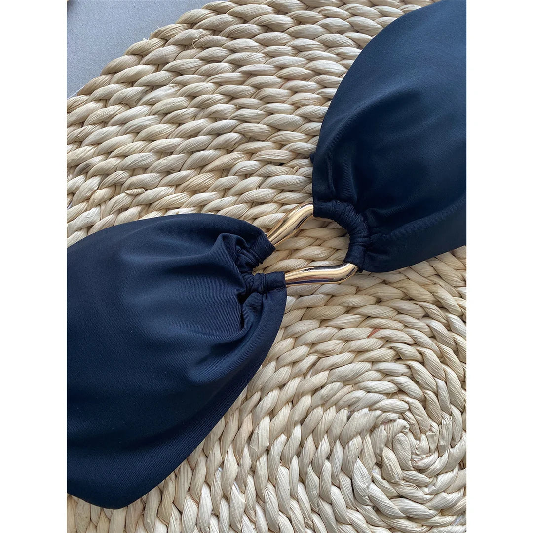 Captivating Bandeau Bikini Set for Women, Features High-Leg Cut and Chic Metal Rings, Two-Piece Swimsuit, Fits True to Size, Available in Sizes S to XL, Material: Nylon and Spandex, Solid Pattern, Low Waist, Wire Free, Modern and Sleek Black Design, Perfect for a Bold Statement Look, Includes Padding