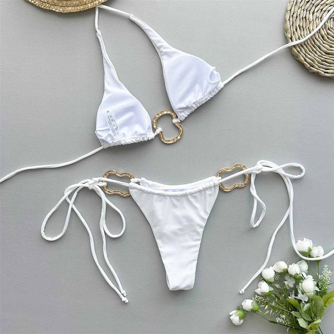 Metal Rings Halter Strappy High Cut Bikini set with chic metal ring accents, Polyester Spandex material, solid pattern, wire-free, low waist design, enhances silhouette for elegance and fashion.