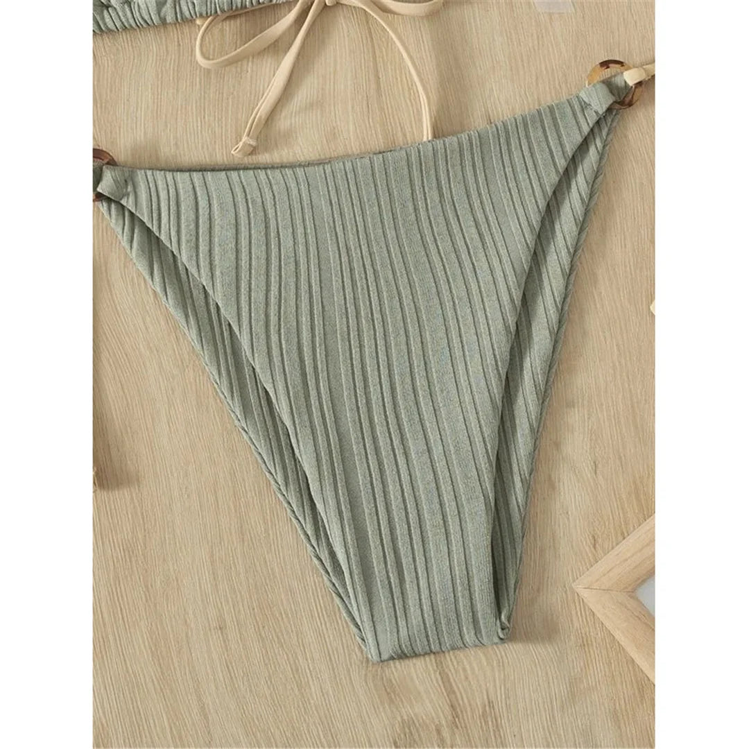 Stylish Ribbed Padded Brazilian Bikini Set, Two-Piece Design with a Flattering Fit, Crafted from Nylon and Spandex, Wire Free Support, Low Waist Style, Available in Women's Sizes S, M, L. Features Solid Pattern and Padded for Comfort, Fits True to Size, Offered in Multiple Colors Including Black, Blue, White, Yellow, Gray, Light Coffee, Light Blue, and Multicolor. Ideal for Women aged 18-35 and Adults, In Stock, New Condition, Free Shipping Available.