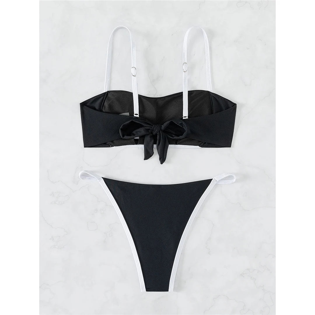 Beautifully Spliced Padded Bikini Set for Women with Chic Knotted Detail. Combines Comfort and Fashion for Stylish Pool Lounging. Comes with Wire Free Support, Low Waist design, and fits True to Size. Available in Black, Green, White, and Coffee.