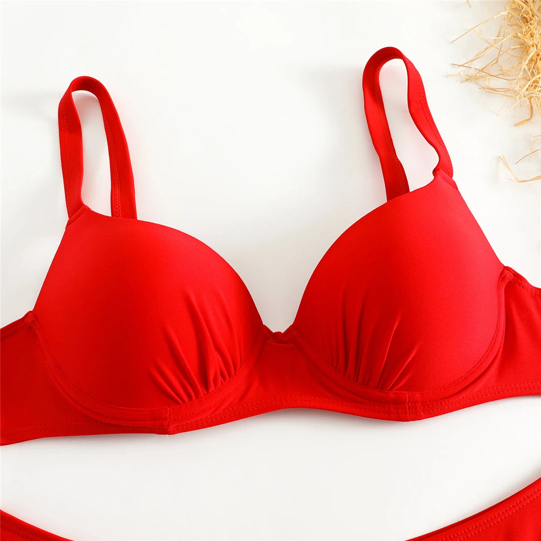 Underwired Bra Cup Brazilian Bikini Set in Solid Black and Red Colors. Made of Nylon and Spandex with Low Waist and Padded Design, Offers Stunning Fit and Style. Available in Sizes S to XL. Perfect for Female Middle Age Group and Adults. Item is in Stock, Includes Free Shipping.