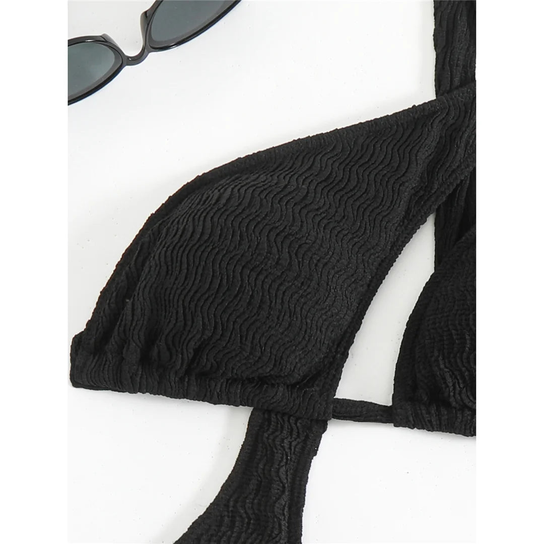 Asymmetric One Shoulder Crinkled Swimsuit with a modern design, crinkled texture, solid monochrome, polyester and spandex blend, adjustable strap for a chic fit.
