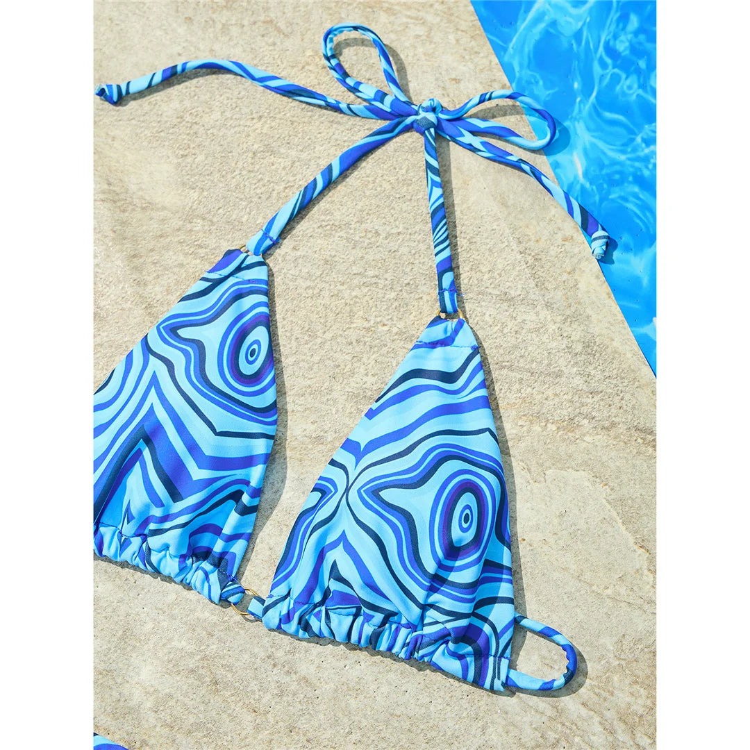 Stunning Four-Color Strappy Halter Bikini Set with Eye-Catching Print, Crafted from Nylon and Spandex. Features Wire Free Support, Low Waist Design in Blue and Multicolor. Ideal for Middle Aged Women. Fits True to Size and Comes with Padding for Extra Comfort. Brand New and in Stock.