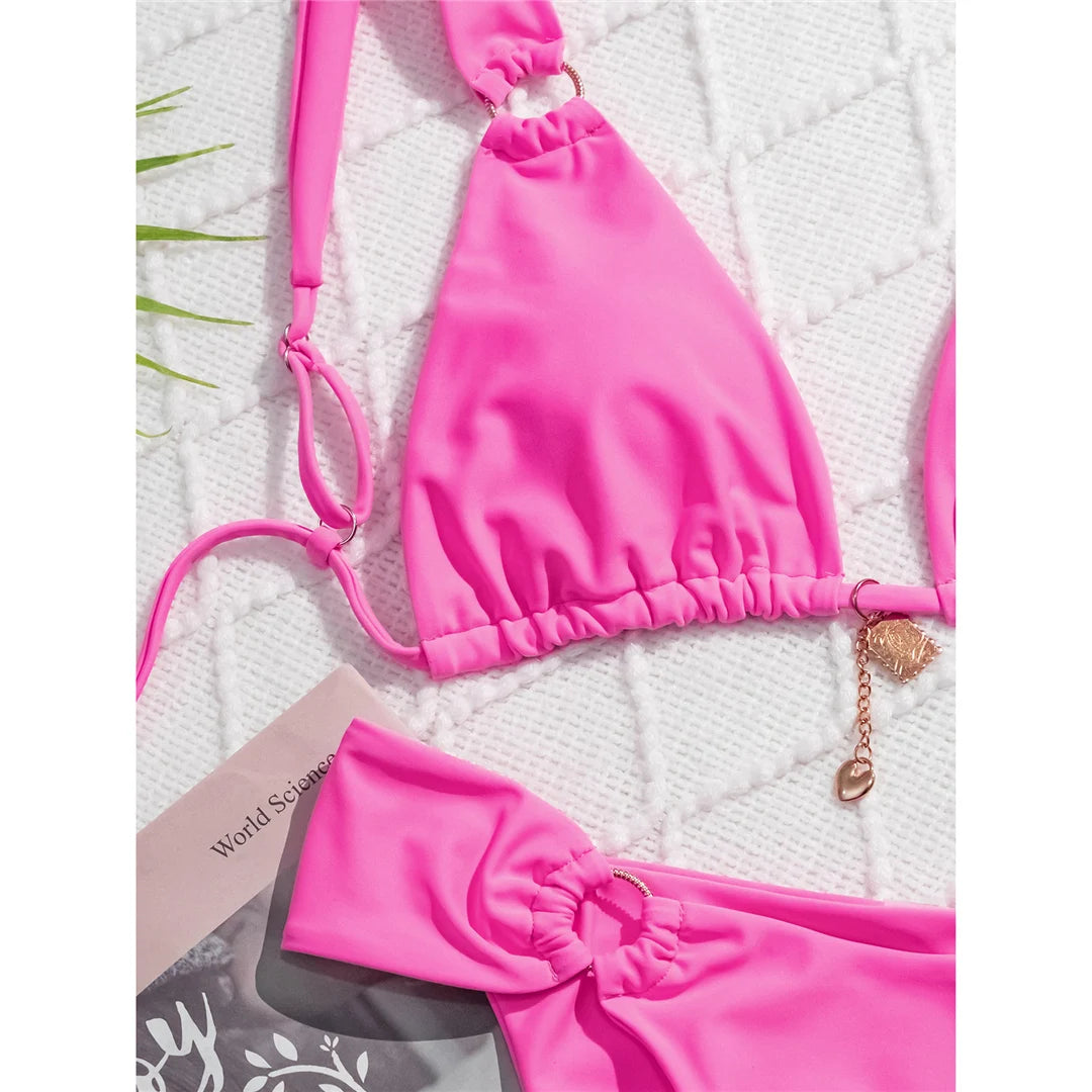 High-leg cut bikini set with stylish metal ring details and padded design for a chic and modern swimwear look for women.