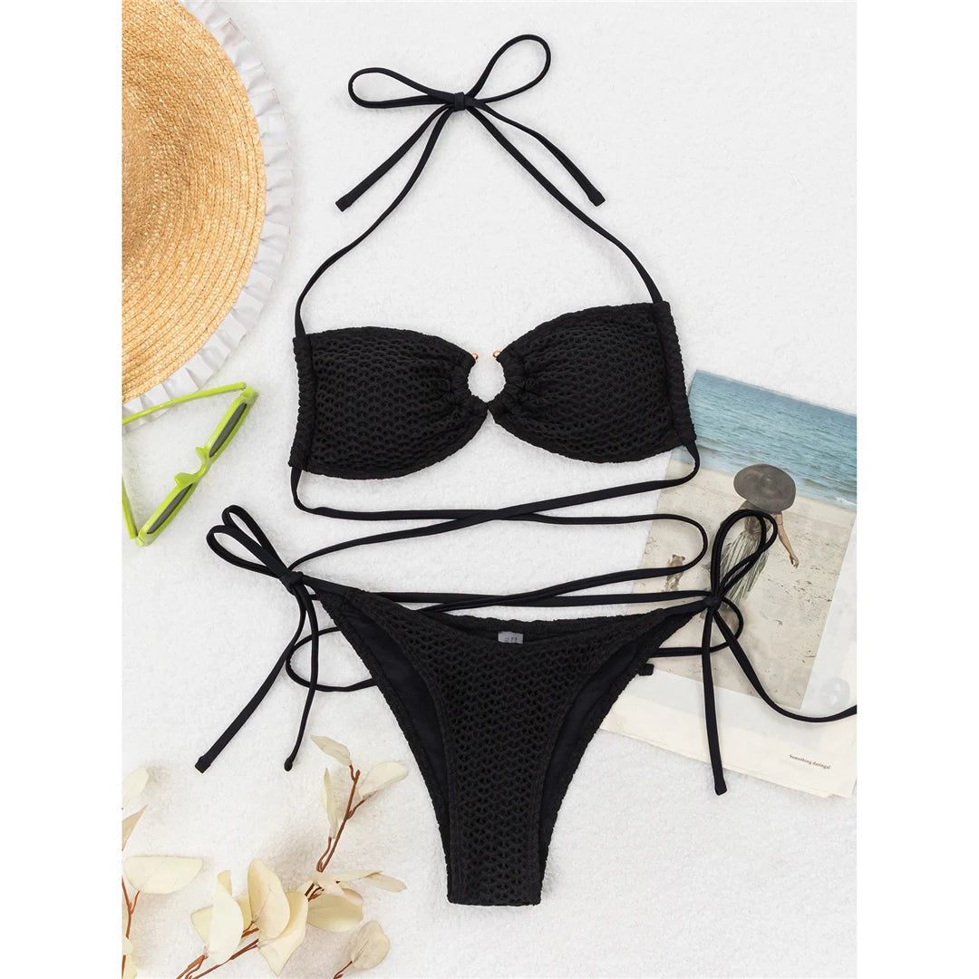 Wrap-around halter high-cut leg bikini set with solid pattern for a chic and comfortable swimwear option for women.
