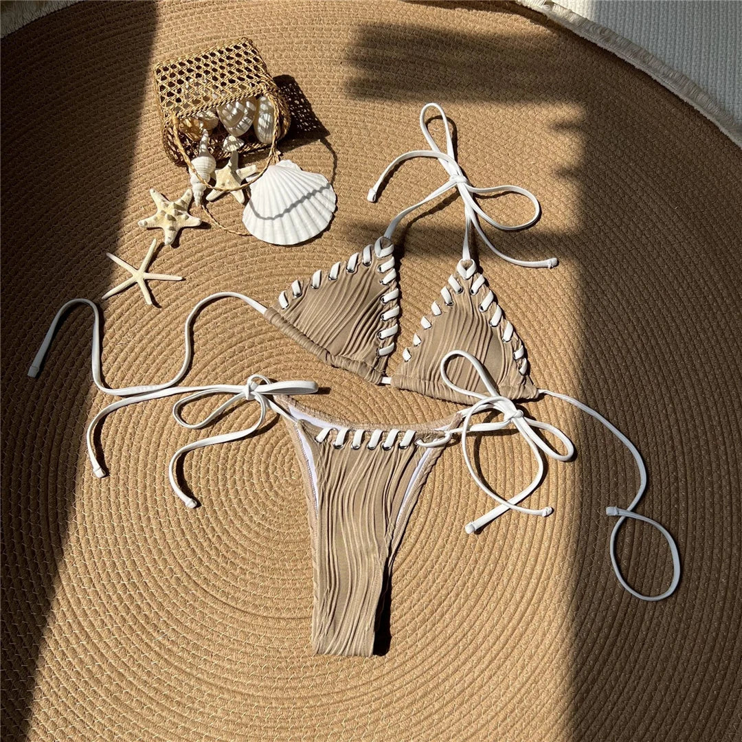 Dive into style with a stunning halter strappy high leg cut two-piece bikini set in vibrant colors. Perfectly designed to accentuate curves, featuring a solid pattern with comfortable halter straps for a perfect sun-ready fit. Made from polyester and spandex, this wire-free, low waist women&#39;s bikini includes a knit-crafted fabric and supportive pads.