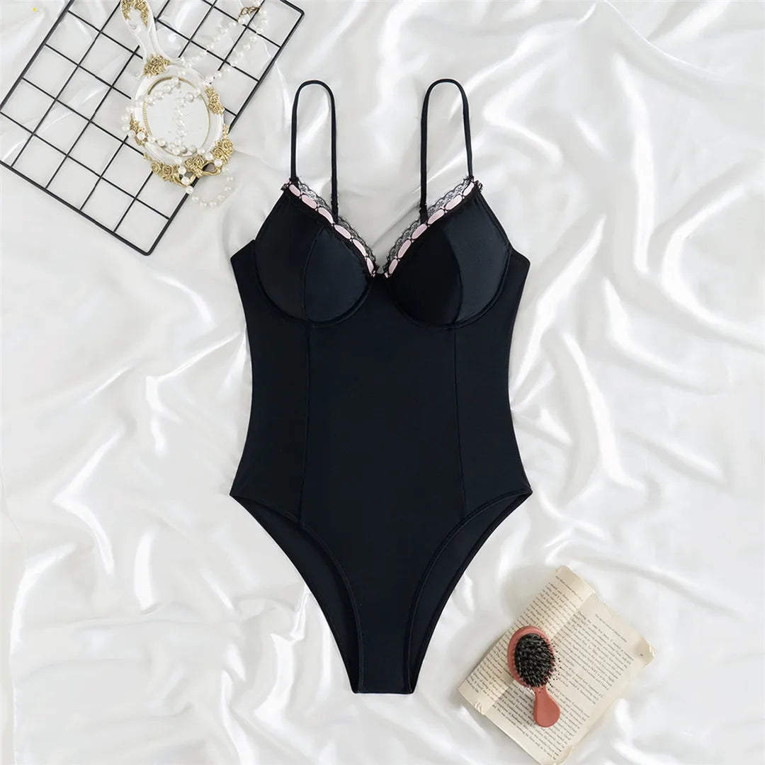 V-neck underwired lace one-piece swimsuit with high-leg cut and sophisticated design for women.