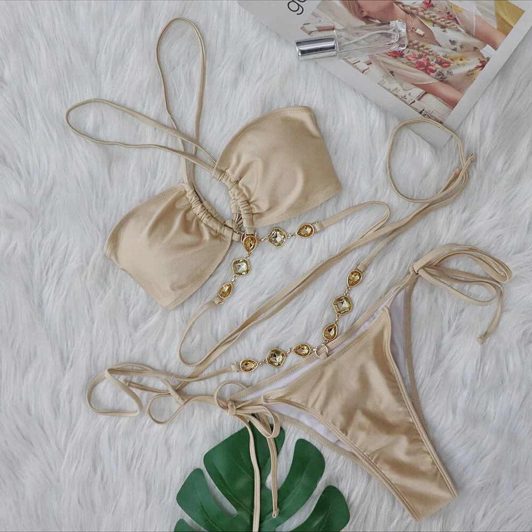 Lake Blue, Camel, Pink, Light Green, Light Purple Two-Piece Diamond Rhinestones Wrap Around Bikini Set. Solid Swimwear made with Nylon and Spandex material. Features Wire-Free Support, Low Waist, and True to Size fitting. Padded for added comfort. Available Sizes: S, M, L. Perfect for Middle-Aged women and adults. In stock with free shipping.