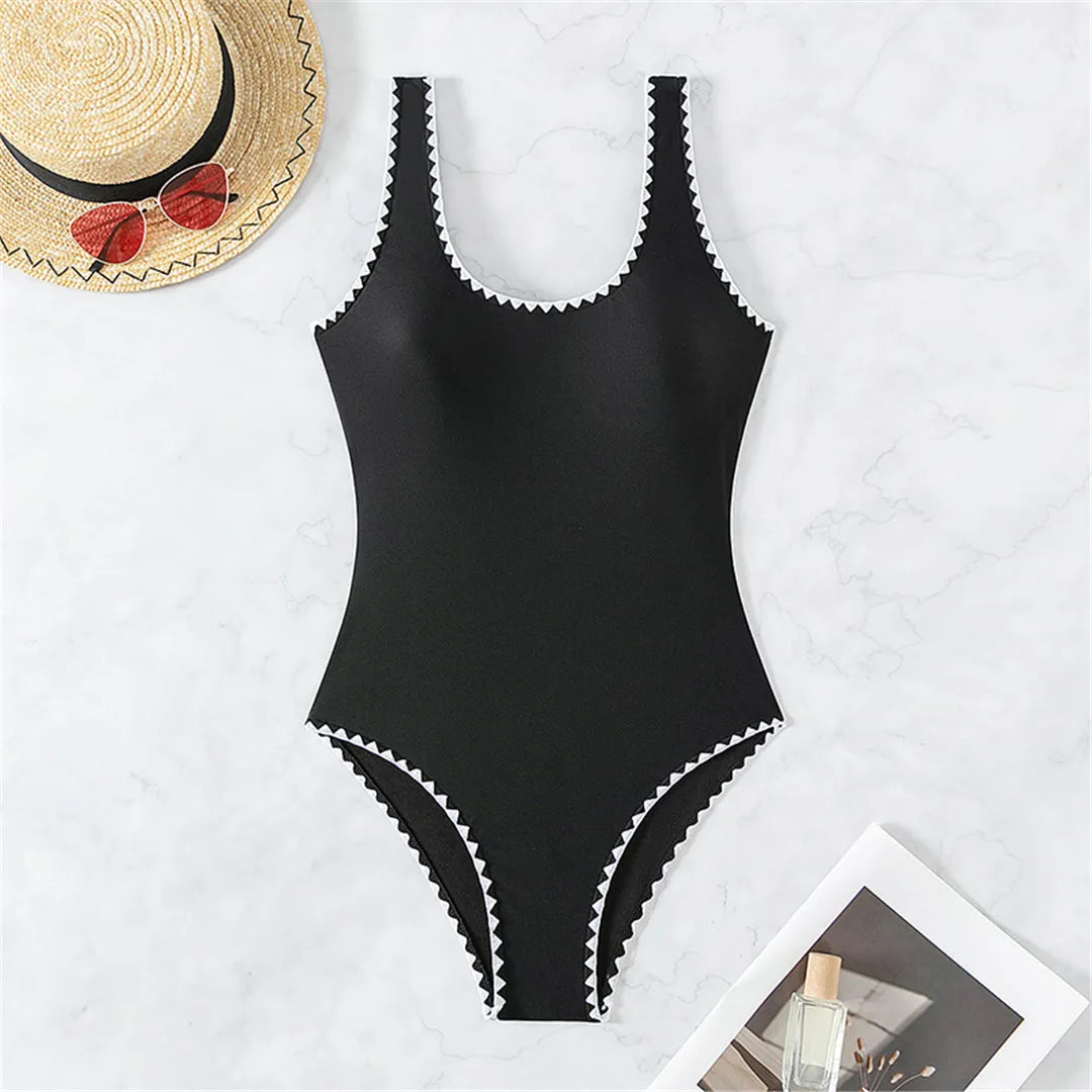 Backless Bordered One Piece Swimsuit for Women, Sleek Black Swimwear with High Leg Cut and Comfortable Padding, Refined and Alluring Design for Stylish Beach Days