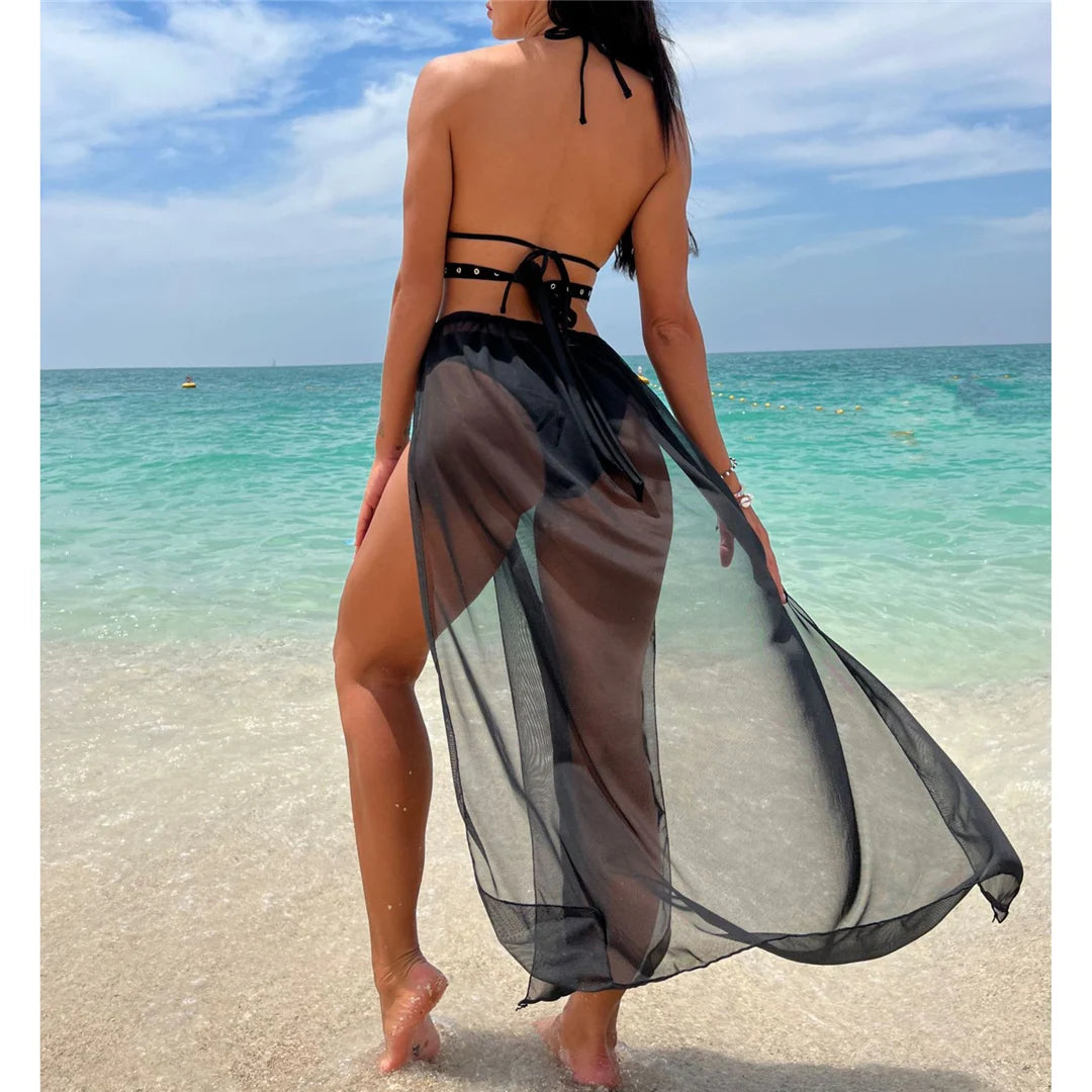 Halter Bikini Set with High Split Skirt, Three Piece Swimwear Ensemble, Made of Nylon and Spandex, Solid Black, Wire-Free Support, Low Waist Design, True to Size, Women&#39;s Bikini Set, Comes with Padding, Available in Sizes Small, Medium, Large, Free Shipping.