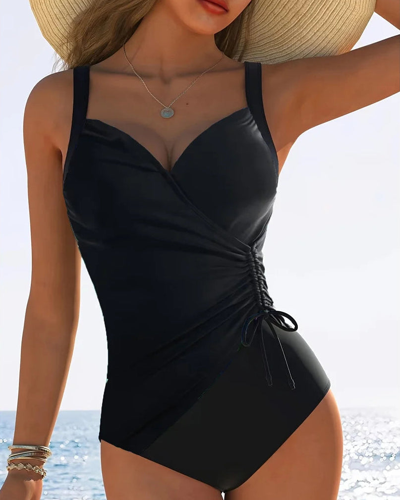 V-neck knotted high-cut leg one-piece swimsuit with padded support and elegant black design for women.