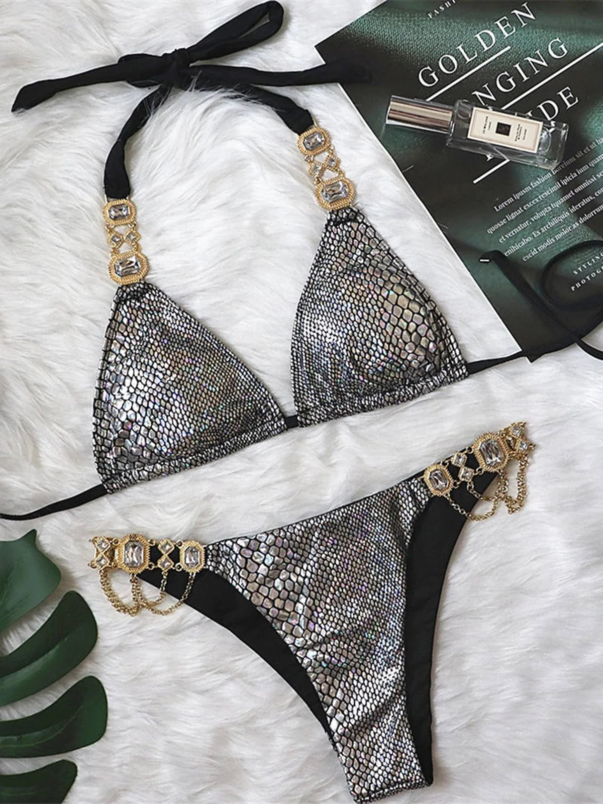 Opulent jewelled rhinestones luxury diamond bikini set available in Yellow, Red, Hot Pink, White, Silver, Purple, Sky Blue, and Black. A shimmering two-piece swimsuit made from nylon and spandex, featuring wire-free support and low waist design. Fits true to size, perfect for women who seek glamour and luxury in their swimwear.