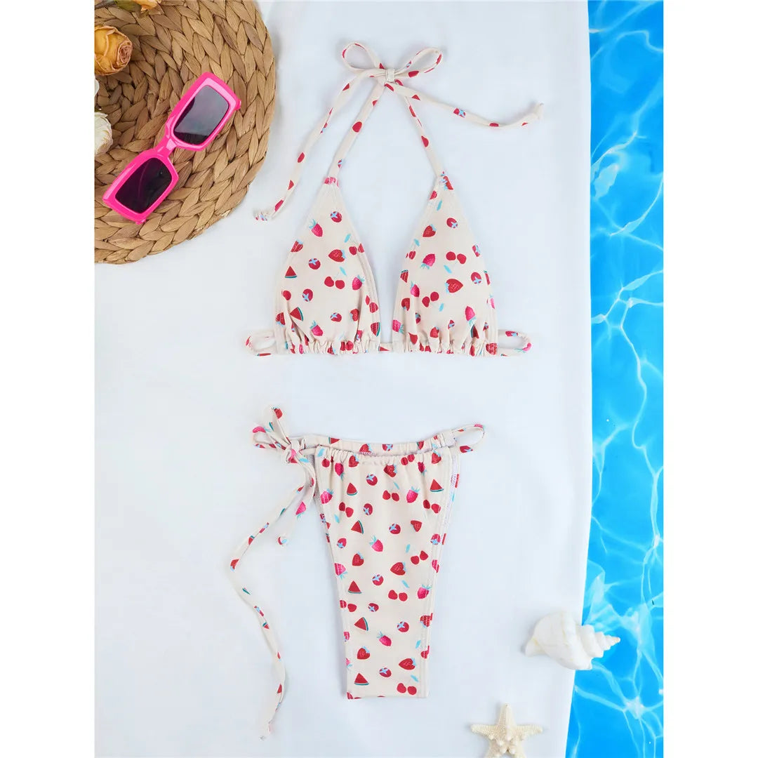 Vibrant Four-Color Halter Bikini Set with Captivating Flower Print, Made from Nylon and Spandex. Features High-Leg Cut, Wire Free Support and Low Waist Style in Green, Blue and Yellow Colors. Fits True to Size, Ideal for Middle Aged Women. Comes with Padding for Extra Comfort. Brand New and Available in Stock.