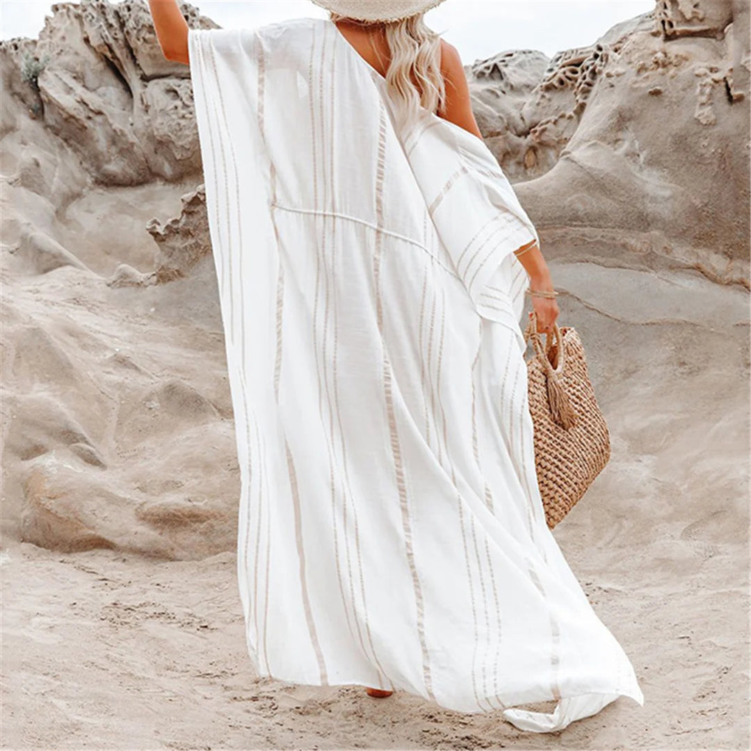 Striped crochet cardigan cover-up with intricate design in blue and orange, offering a bohemian flair.