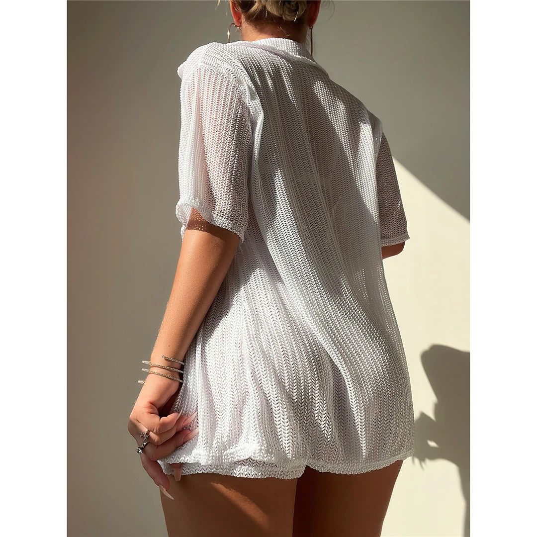 Charming Short-Sleeve Crochet Tunic for Women, Airy Knitted Beach Cover-Up, Fits True to Size, Sizes S to XL Available, Material: Nylon, Polyester, Cotton, Solid Pattern, Ideal for Seaside Strolls and Casual Resort Wear, Available in Black, Beige, and White